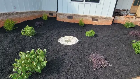 New planting bed and landscape design around a Charlotte, NC home