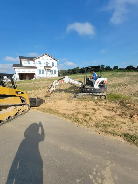 Skid steer and mini excavator working a lot in Charlotte NC